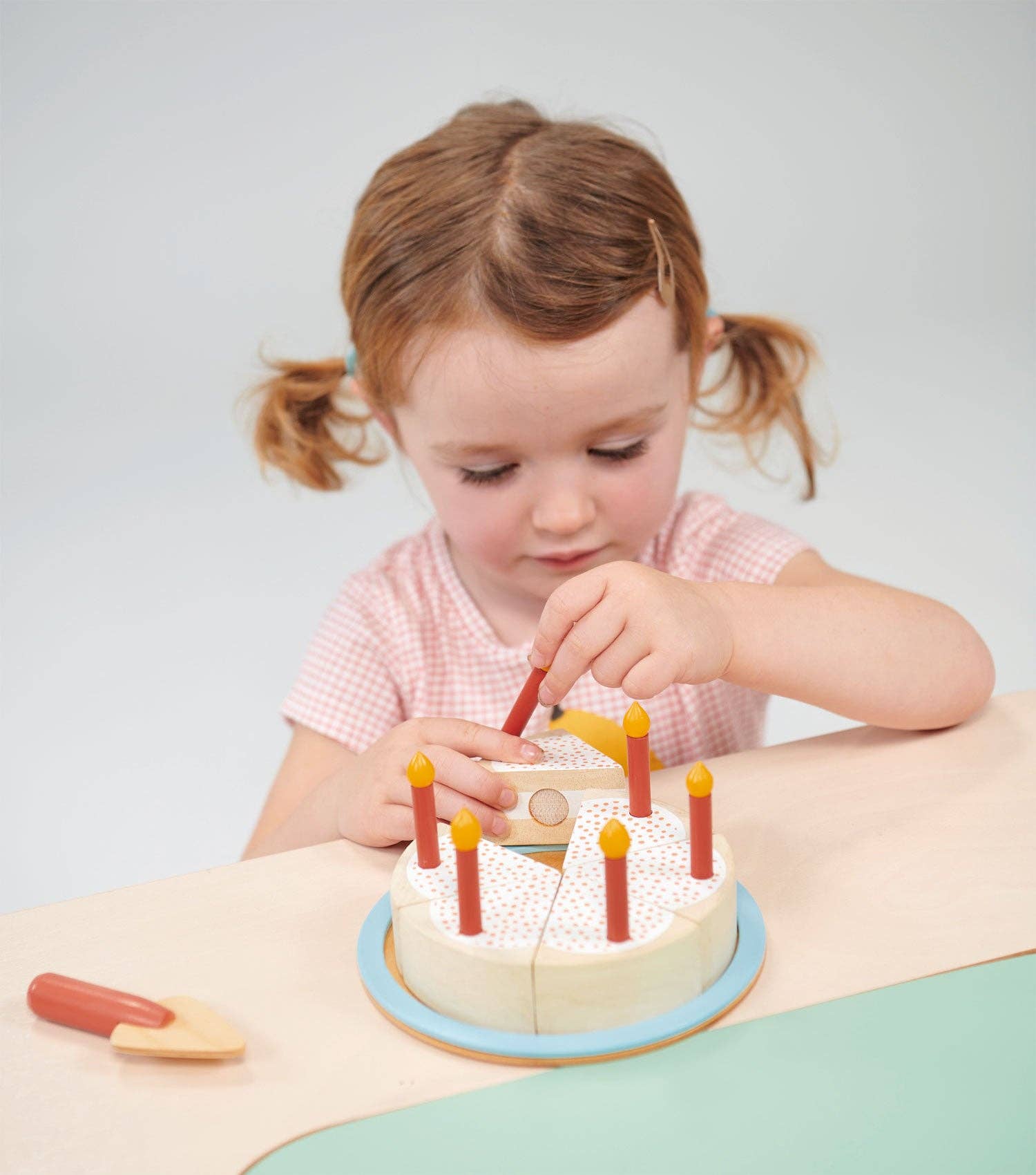 Mentari brand eco-friendly wood party cake encourages pretend and social play for little children.