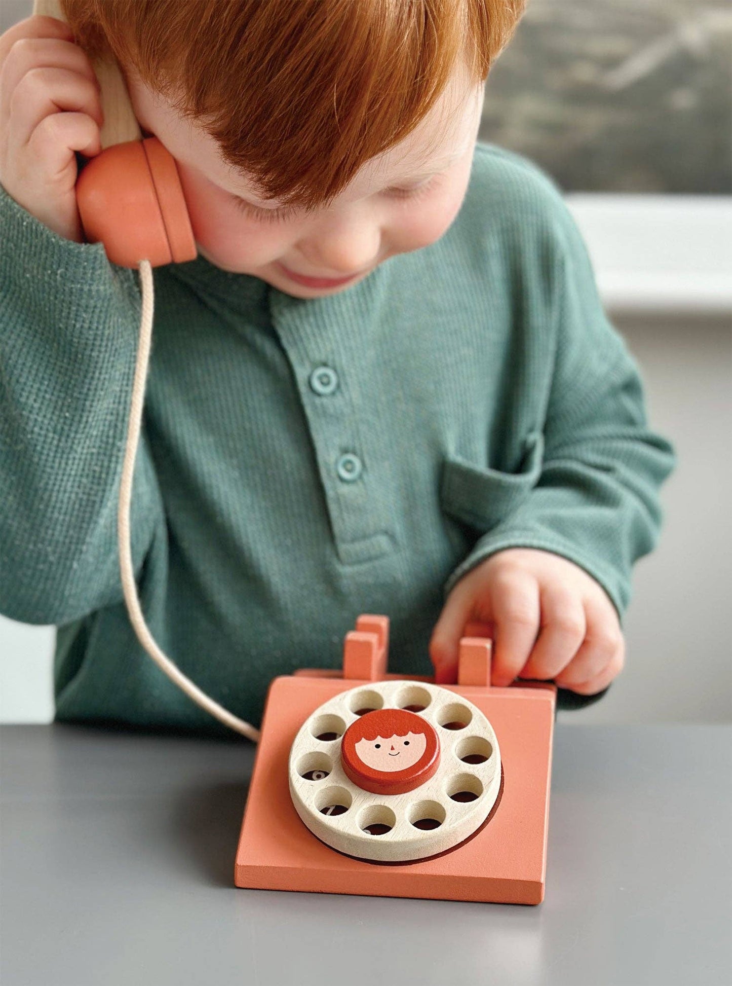 Mentari brand wooden vintage toy telephone to promote social and pretend play. 