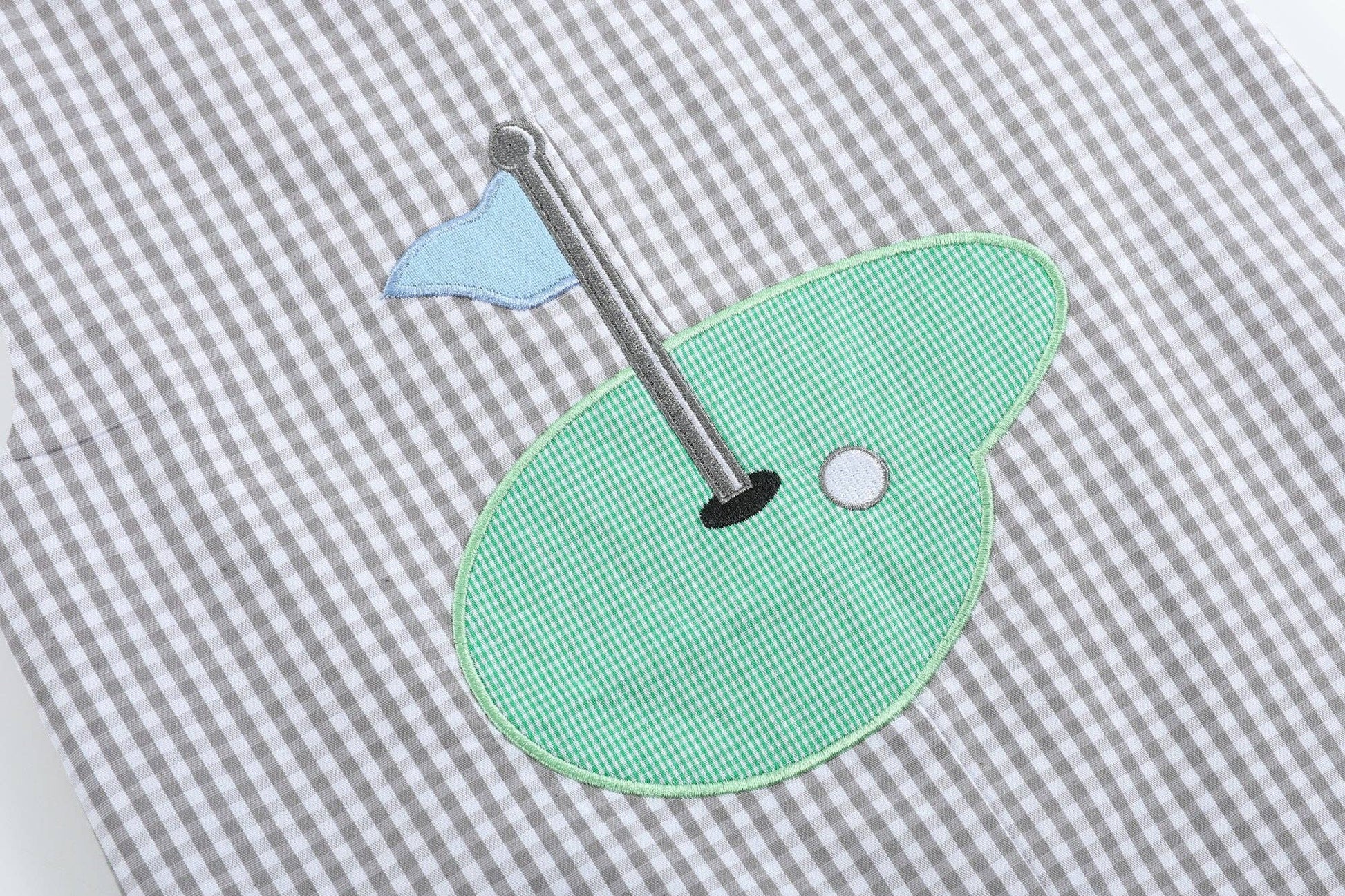 Lil Cactus brand grey gingham shortall for your little hole in one golfer.