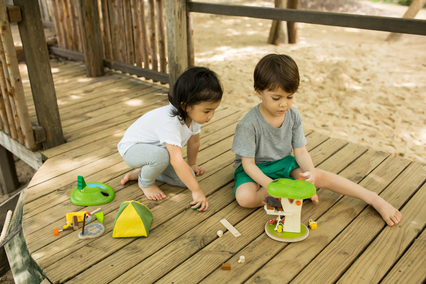 wooden treehouse with mushrooms, animals and people toy