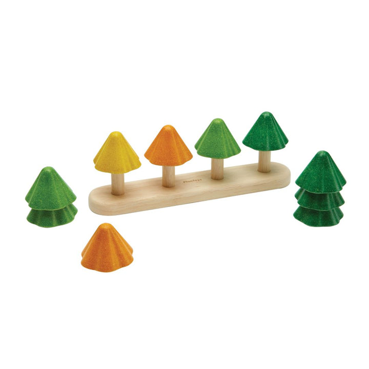 Plantoys brand sustainable sorting and stacking trees can mix and match and teach counting and colors.