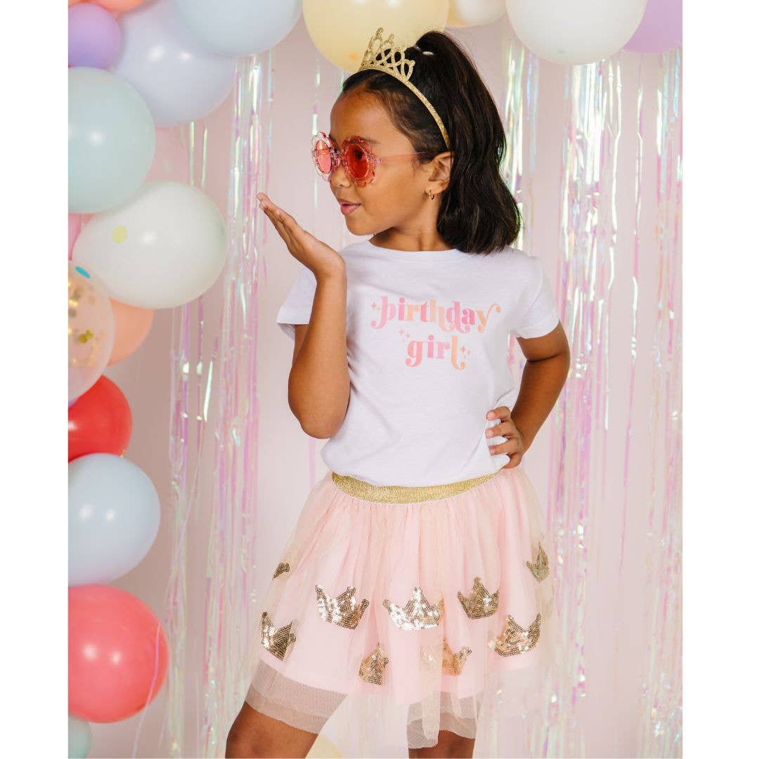 Pink tutu with gold sequin crowns for birthday party