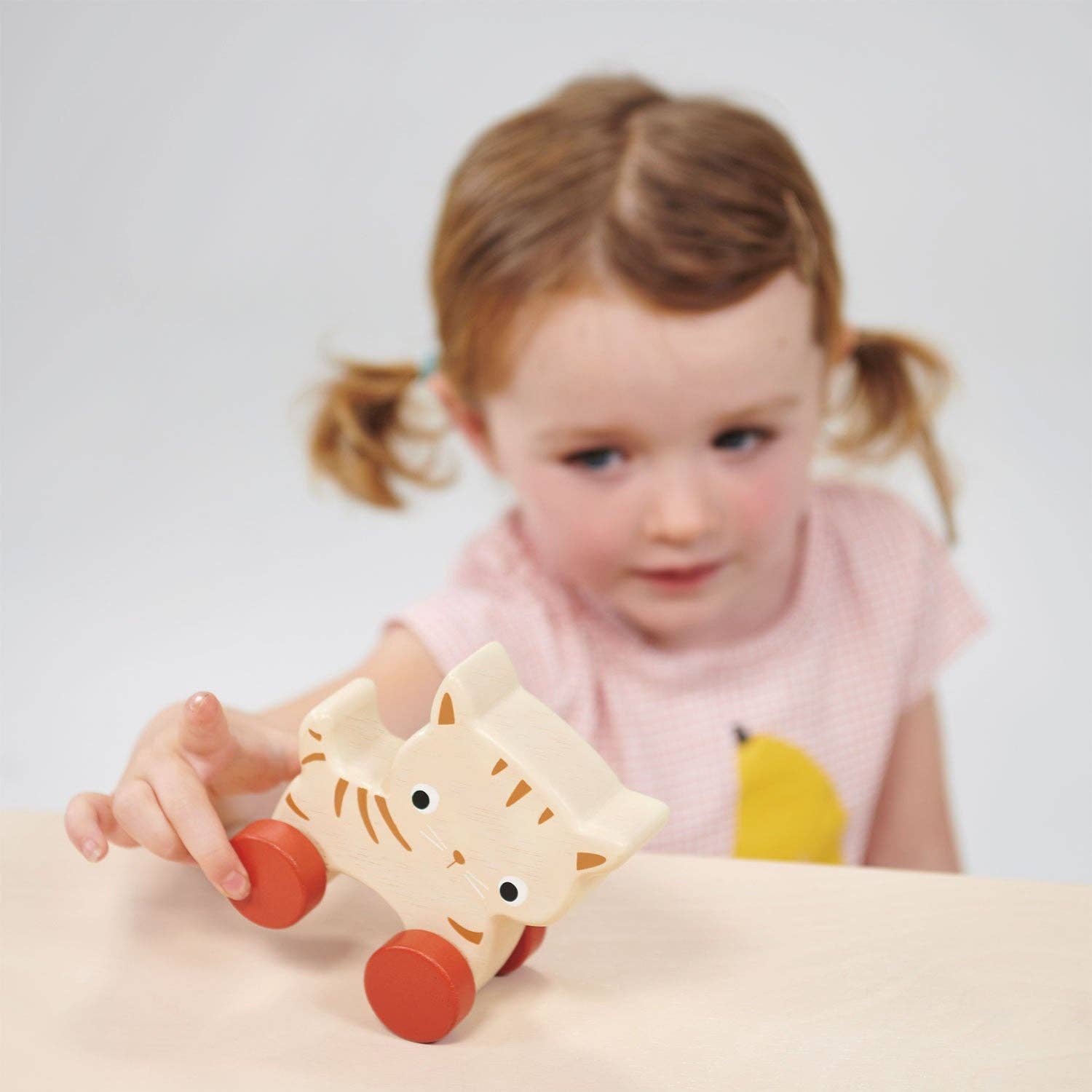 Mentari brand sustainable wooden push along rolling kitty cat pet toy for toddlers.