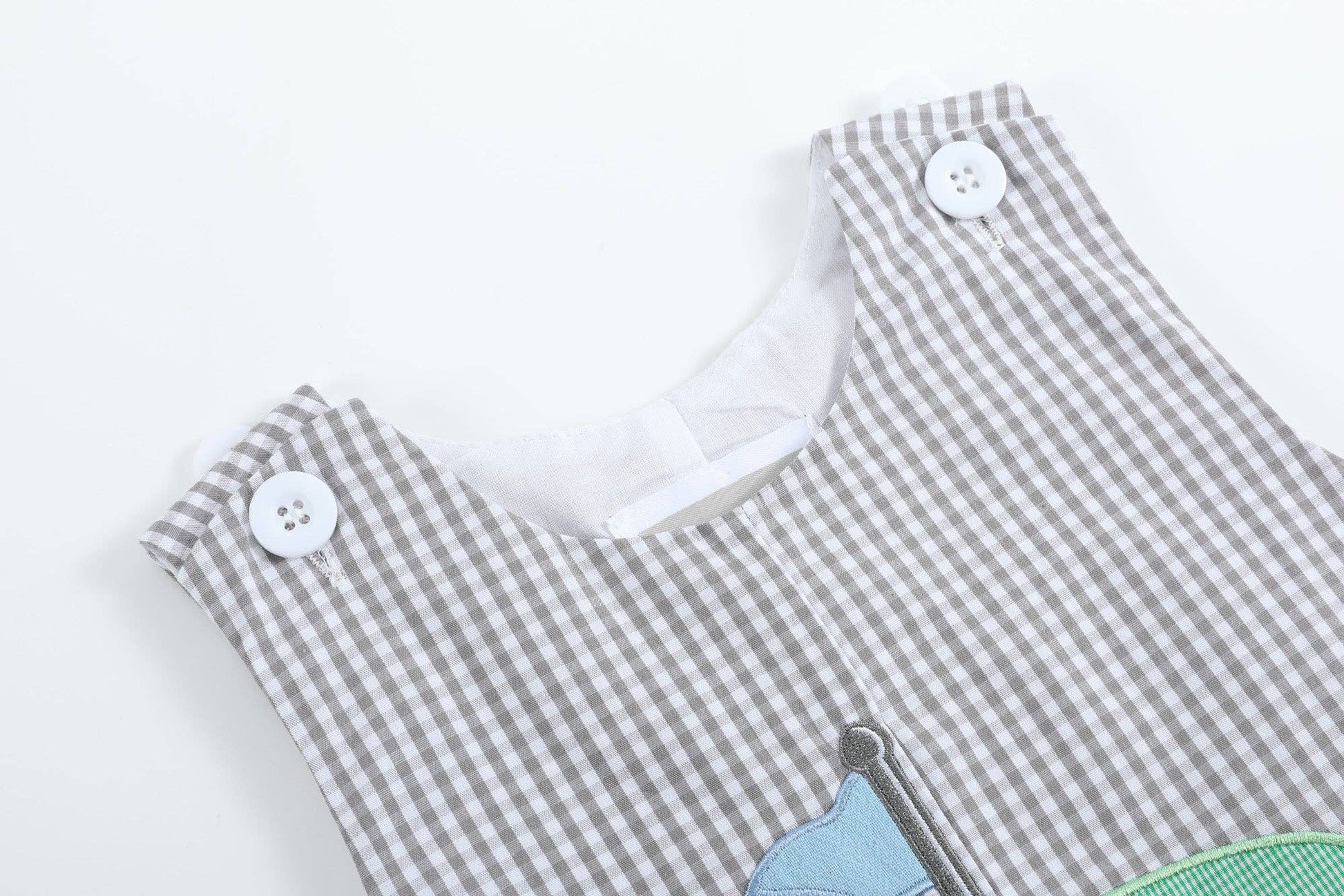 Lil Cactus brand grey gingham shortall with golf applique for baby boy's first hole in one.