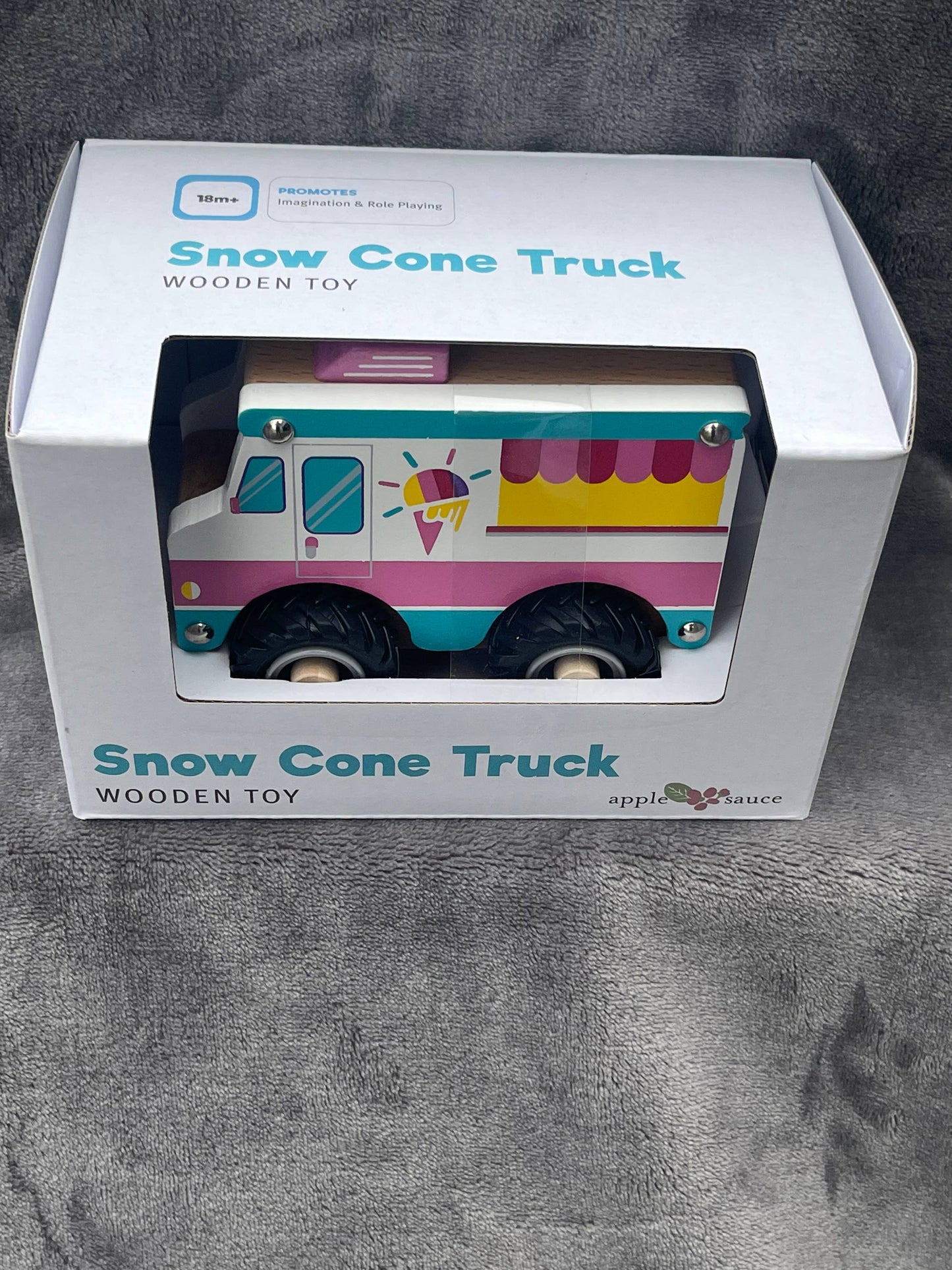 Wood snow cone truck toy to promote imagination and role playing. 