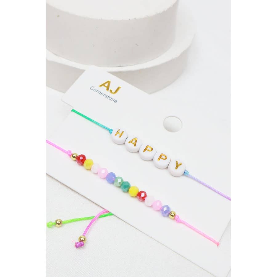 Wish a happy birthday with this set of two bracelets that are brightly colored and easy to stack.