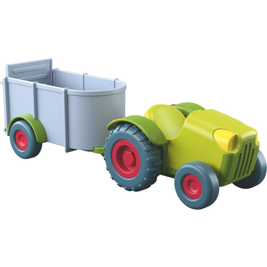 Haba brand tractor and trailer playset for 2 year old child.